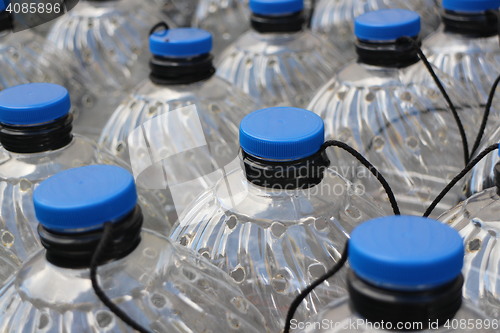 Image of  row plastic bottles 