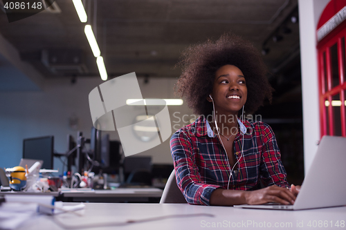 Image of portrait of a young successful African-American woman in modern 