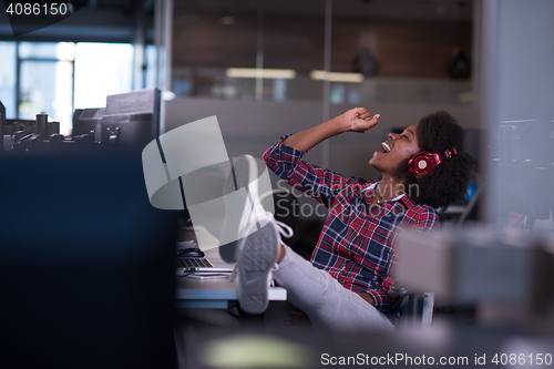 Image of portrait of a young successful African-American woman in modern 