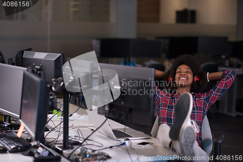 Image of portrait of a young successful African-American woman in modern 
