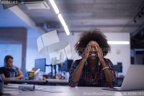 Image of portrait of a young successful African-American woman in modern 