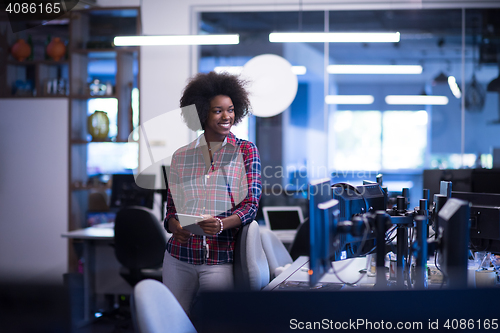 Image of portrait of a young successful African-American woman in modern 