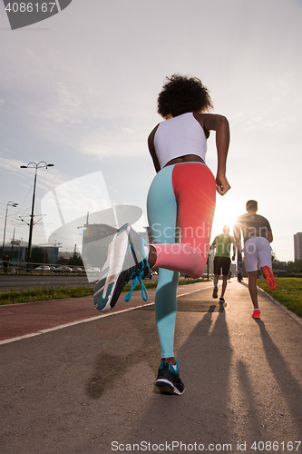 Image of multiethnic group of people on the jogging