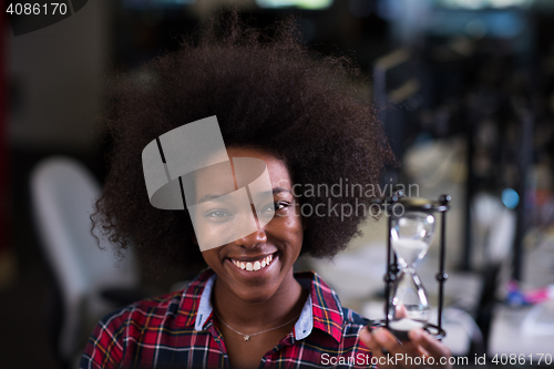 Image of portrait of a young successful African-American woman in modern 