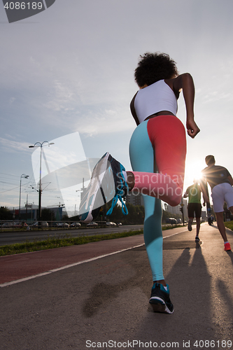 Image of multiethnic group of people on the jogging