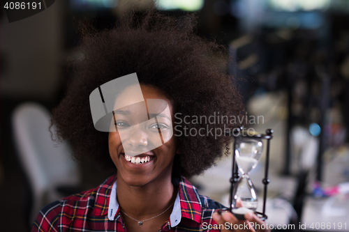 Image of portrait of a young successful African-American woman in modern 