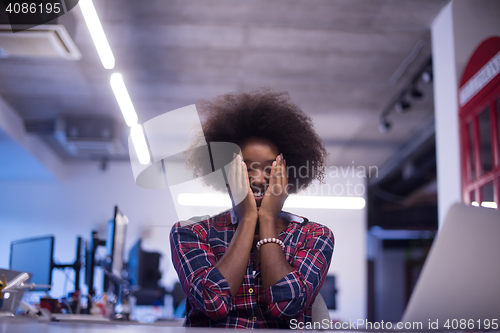Image of portrait of a young successful African-American woman in modern 