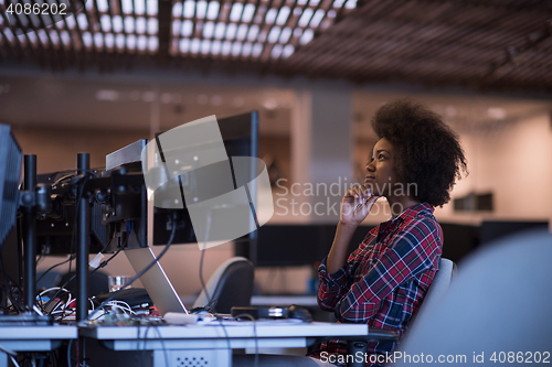 Image of portrait of a young successful African-American woman in modern 