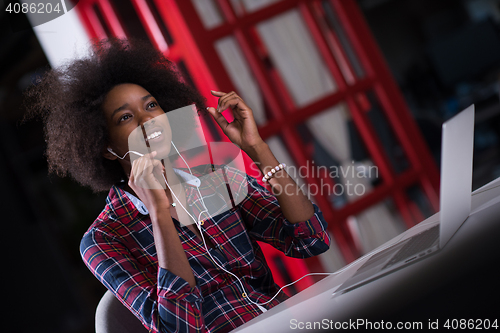 Image of portrait of a young successful African-American woman in modern 