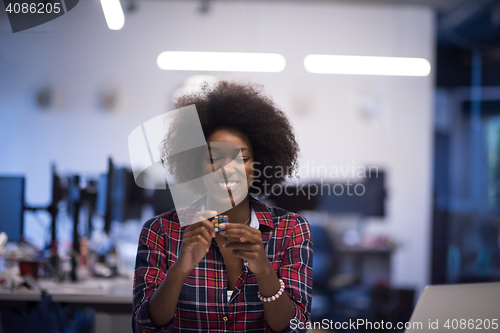 Image of portrait of a young successful African-American woman in modern 