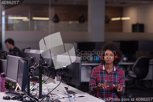 Image of portrait of a young successful African-American woman in modern 