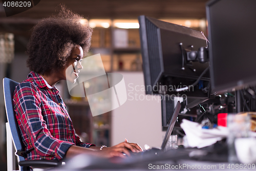 Image of portrait of a young successful African-American woman in modern 