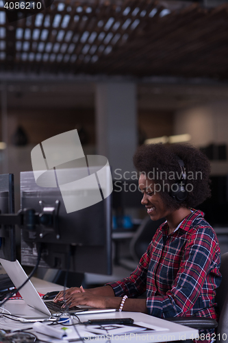 Image of portrait of a young successful African-American woman in modern 