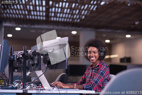 Image of portrait of a young successful African-American woman in modern 