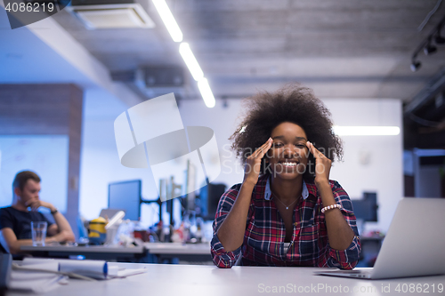 Image of portrait of a young successful African-American woman in modern 