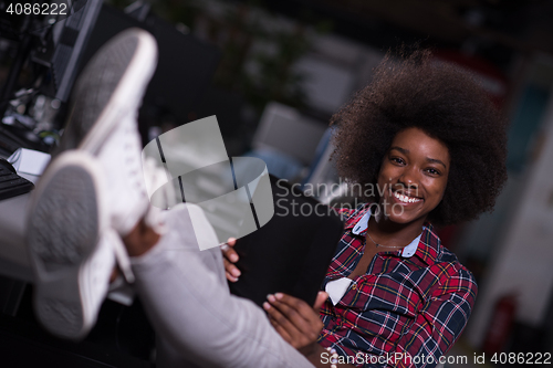 Image of portrait of a young successful African-American woman in modern 