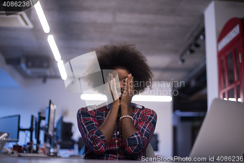 Image of portrait of a young successful African-American woman in modern 