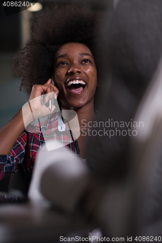 Image of portrait of a young successful African-American woman in modern 