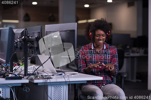 Image of portrait of a young successful African-American woman in modern 