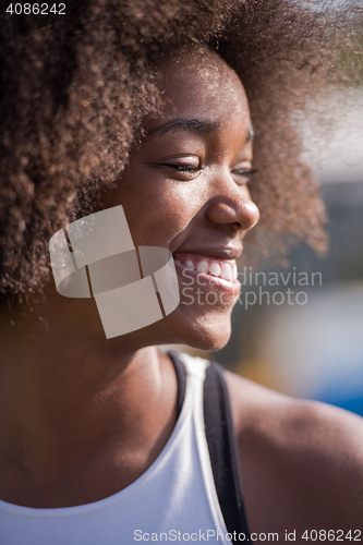 Image of Close up portrait of a beautiful young african american woman sm