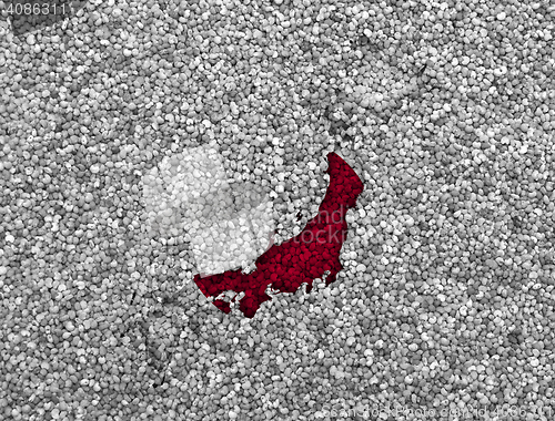 Image of Map and flag of Japan on poppy seeds