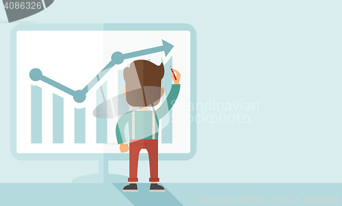 Image of Successful businessman with a chart going up