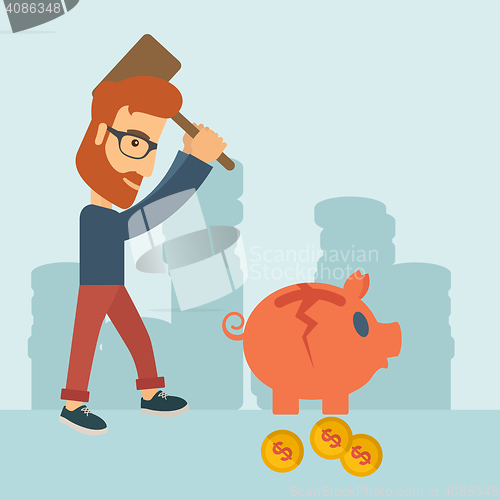 Image of Man breaking piggy bank