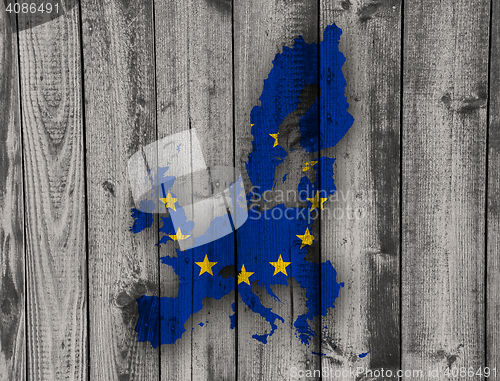 Image of Map and flag of the EU on weathered wood