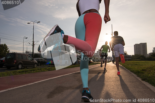 Image of multiethnic group of people on the jogging