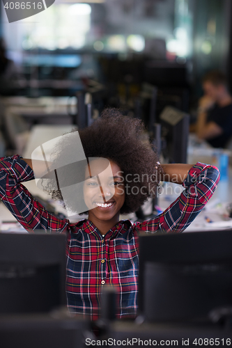 Image of portrait of a young successful African-American woman in modern 