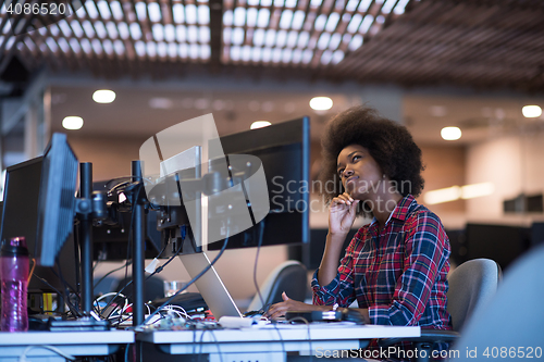 Image of portrait of a young successful African-American woman in modern 