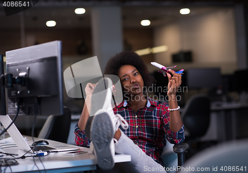 Image of portrait of a young successful African-American woman in modern 