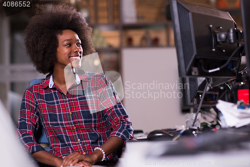 Image of portrait of a young successful African-American woman in modern 