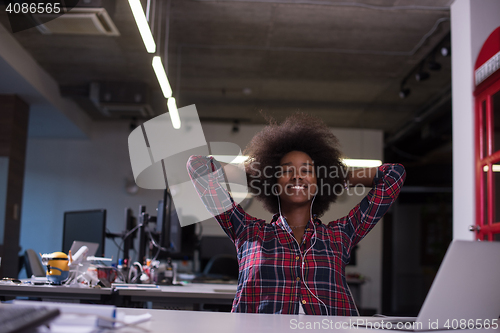 Image of portrait of a young successful African-American woman in modern 