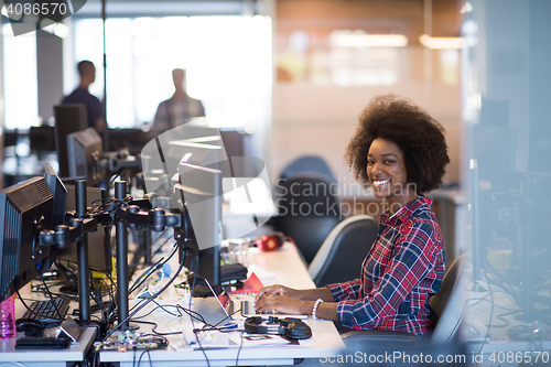 Image of portrait of a young successful African-American woman in modern 