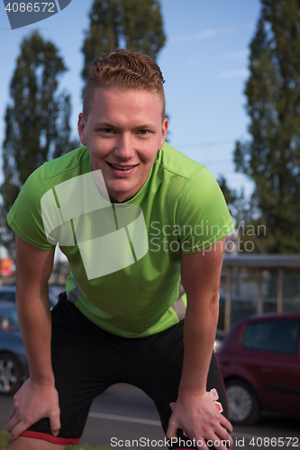 Image of portrait of a young man on jogging