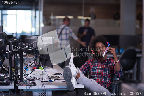 Image of portrait of a young successful African-American woman in modern 