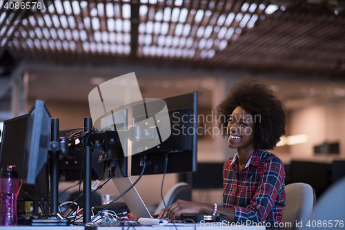 Image of portrait of a young successful African-American woman in modern 