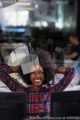 Image of portrait of a young successful African-American woman in modern 