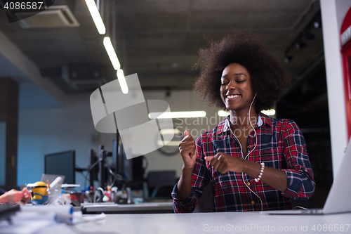 Image of portrait of a young successful African-American woman in modern 