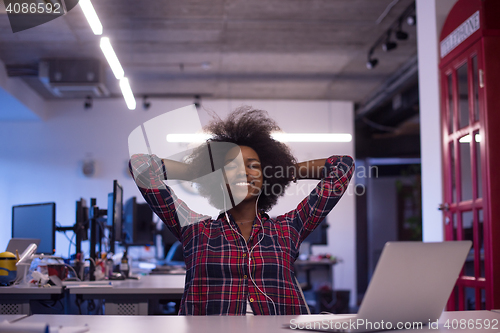 Image of portrait of a young successful African-American woman in modern 