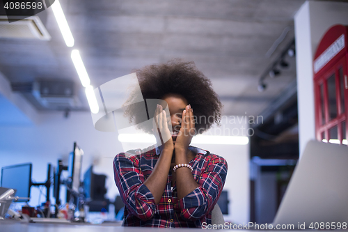 Image of portrait of a young successful African-American woman in modern 