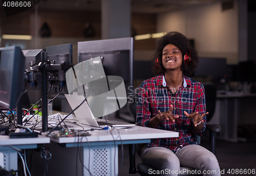 Image of portrait of a young successful African-American woman in modern 