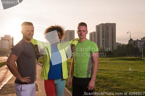 Image of portrait multiethnic group of people on the jogging