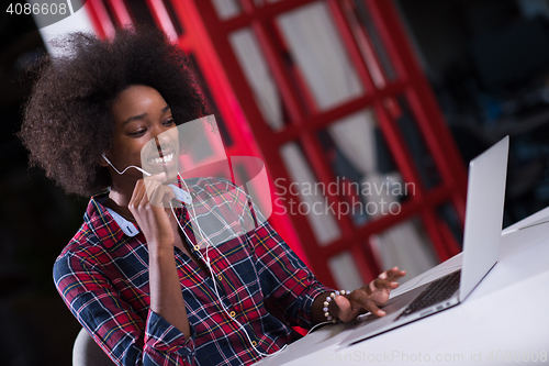 Image of portrait of a young successful African-American woman in modern 