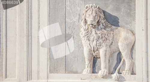 Image of Marble lion on church facade