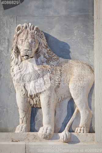 Image of Marble lion on church facade