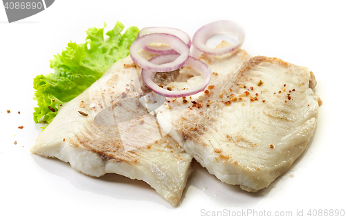 Image of roasted bream fish fillets on white background