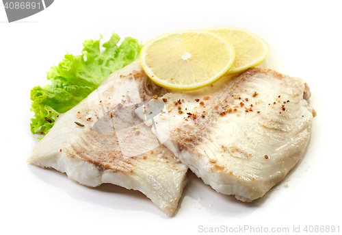 Image of roasted bream fish fillets on white background