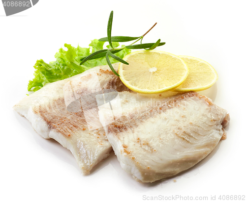 Image of roasted bream fish fillets on white background